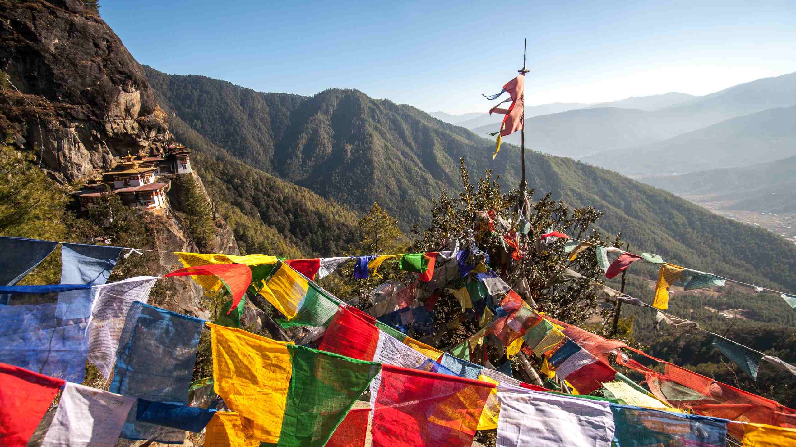 Buddhism prayer flags on the Tiger's Nest temples (Taktsang), Bhutan. Photo Credit: maodoltee