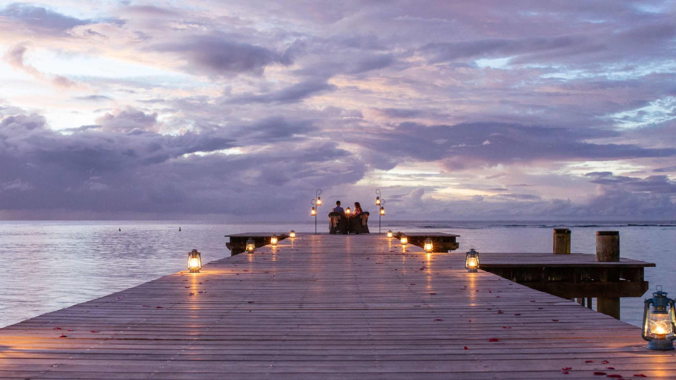 tokoriki-island-resort-fiji-sunset-dining-jetty-romantic-couple-rose-petals
