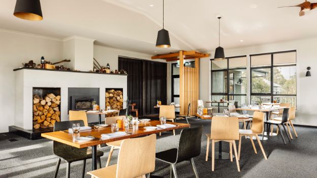 cradle-mountain-hotel-tasmania-australia-restaurant-interior-fireplace