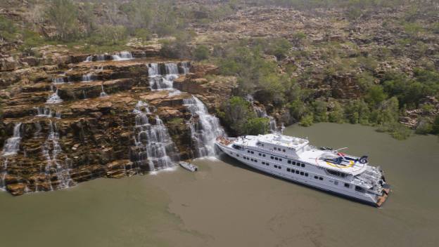 true-north-kimberley-western-australia-luxury-cruise-helicopter-waterfall
