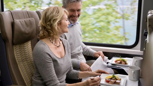 rocky-mountaineer-rail-canadian-rockies-silverleaf-service-dome-cabins-guests-lunch-service