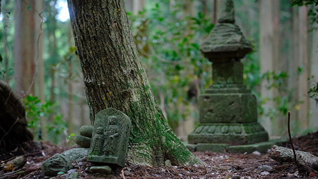 old-stone-statue-kumano-kodo-pilgrimage-routes-wakayama-japan-shutterstock1970863922