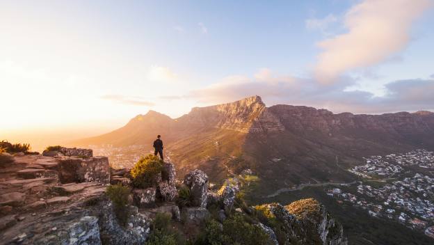 lions-head-summit-cape-town-south-africa-hiker-sunset