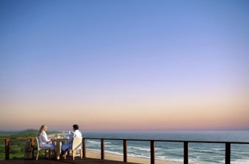 white-pearl-resorts-ponta-mamoli-mozambique-couple-deck-breakfast