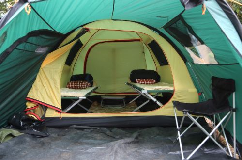 mount-kilimanjaro-luxury-camping-tent-bed-chair-campsite-tanzania-africa