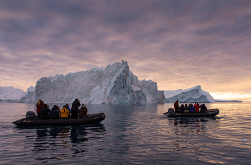 zodiac-cruising-IIulissat-greenland-iceberg