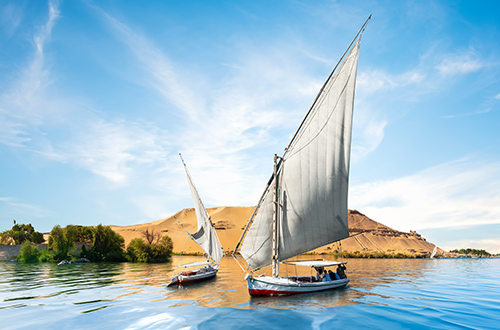 aswan-boats-nile-river-sunset