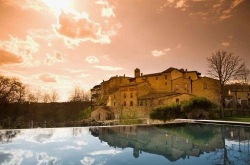 castel-monastero-tuscany-italy-pool-exterior