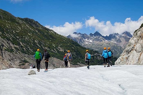 swiss-alps-mountain-range-switzerland-hikers
