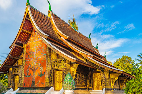 buddhist-temple-golden-city-wat-xieng-thong-luang-prabang-laos-shutterstock1993519505
