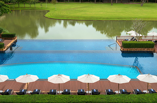 le-meridien-chiang-rai-resort-thailand-pool-lagoon-and-lawn
