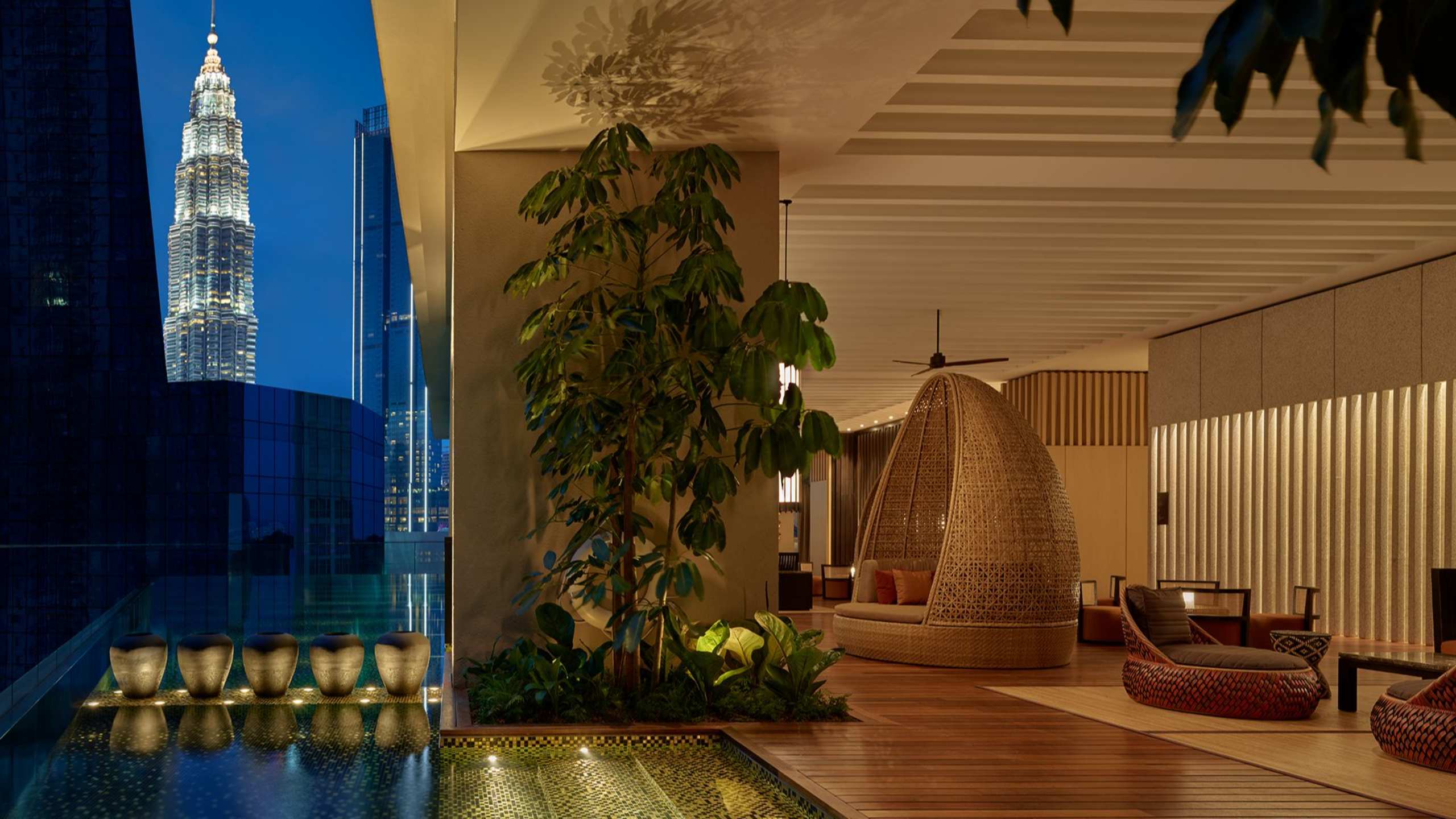 ruma-hotel-residences-kuala-lumpur-malaysia-outdoor-swimming-pool-views-petronas-twin-towers